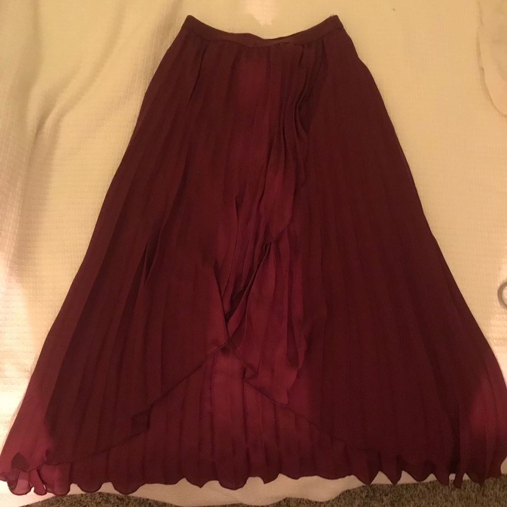 Red pleated wrap skirt